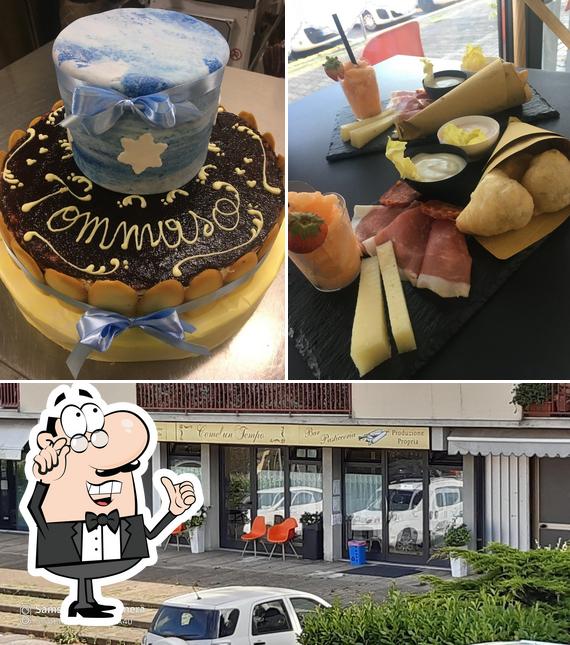 La foto della interni e torta di Bar Come un Tempo