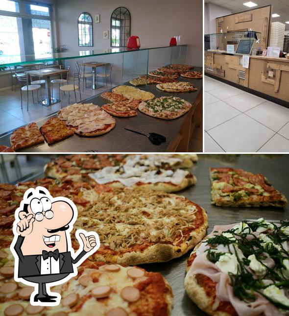 Dai un’occhiata alla foto che mostra la interni e pizza di Il Quinto Gusto