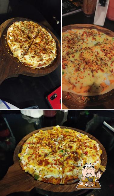 Pick pizza at Plan-Big Café & Family Restaurant ಪ್ಲಾನ್-ಬಿ ಕೆಫೆ ಮತ್ತು ಫ್ಯಾಮಿಲಿ ರೆಸ್ಟೋರೆಂಟ್