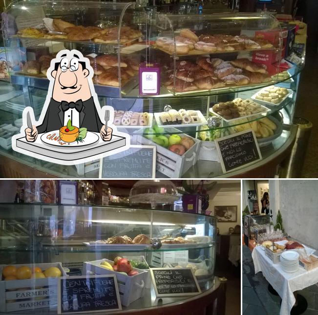 Questa è la foto che presenta la cibo e tavolo da pranzo di Caffè La Dolce Vita