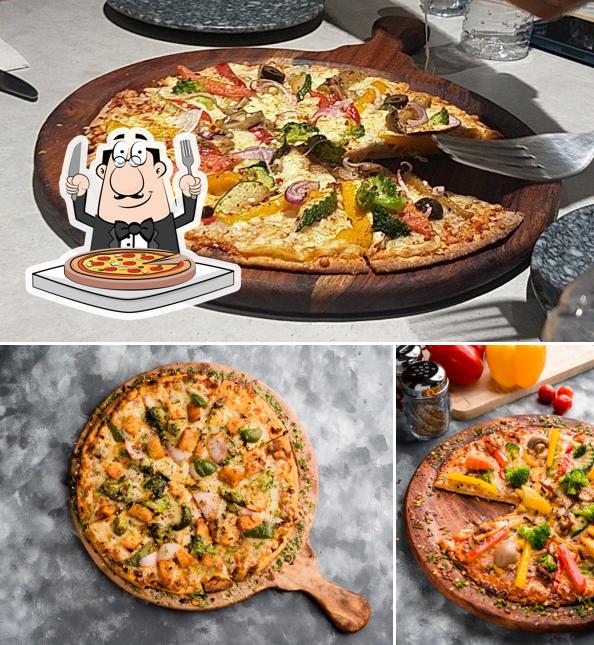 Try out pizza at Kraft Kitchen- A Cafe By Good Bakery