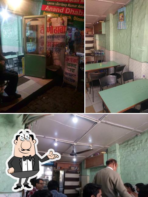 Take a seat at one of the tables at Sher E Punjab Anand Dhaba