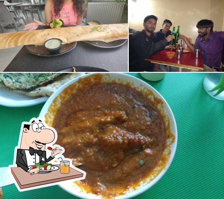 Take a look at the picture depicting food and bar counter at Hotel Banana Leaf