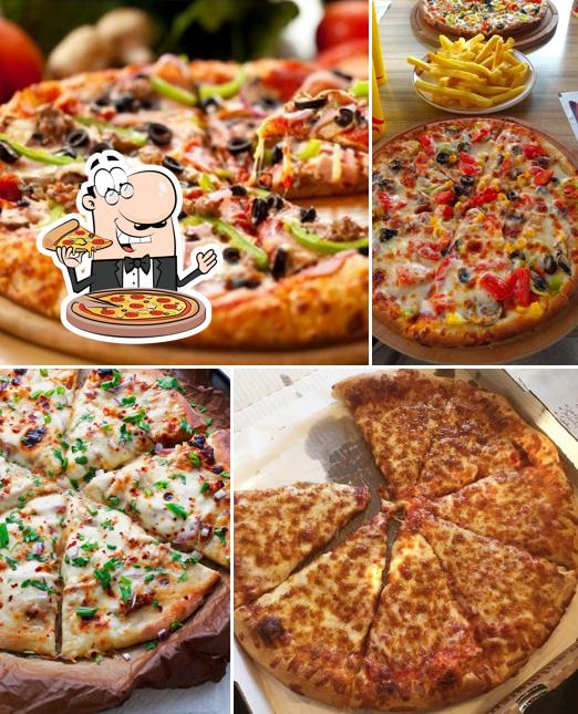 Get pizza at Dark House Cafe