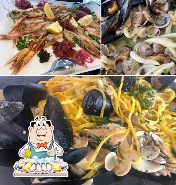 Prenditi la cucina di mare a Lord Beach 69 Ristorante Pizzeria