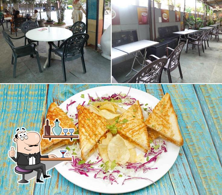 Take a look at the picture showing interior and food at Shambhu's Coffee Bar