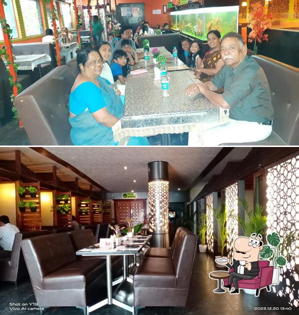 Take a seat at one of the tables at The Guntur Gongura