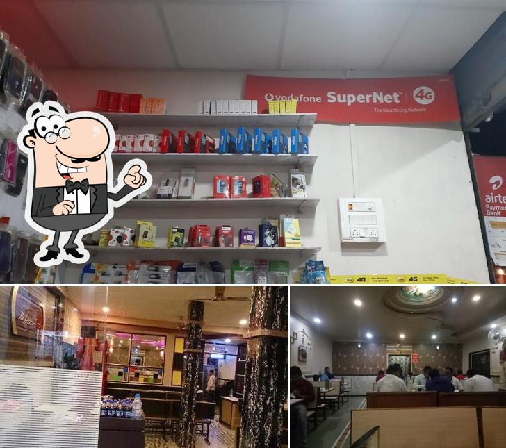 Take a seat at one of the tables at Hotel City