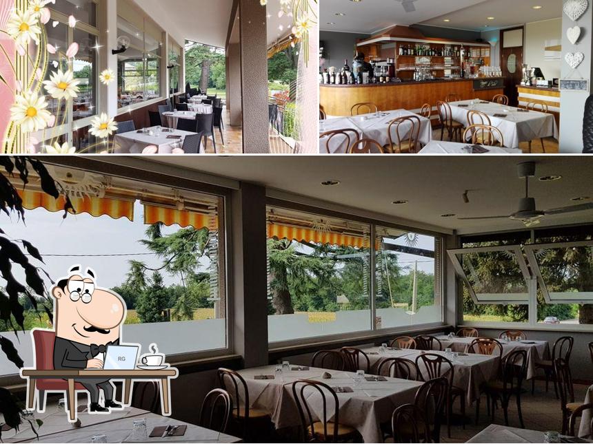 Dai un'occhiata agli interni di Pizzeria Raggio di Sole