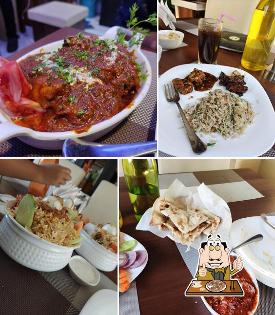 Get pizza at Bhoj Paradise