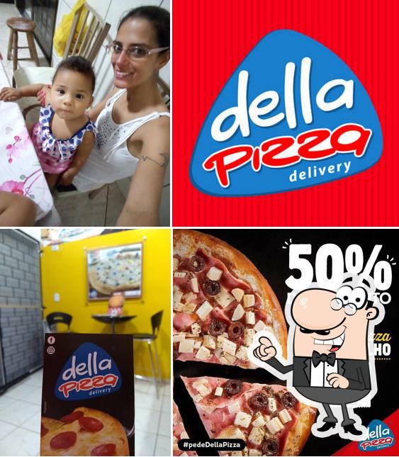 O interior do Della Pizza Delivery