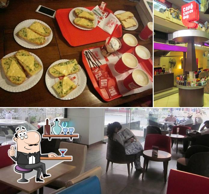 Take a seat at one of the tables at Café Coffee Day