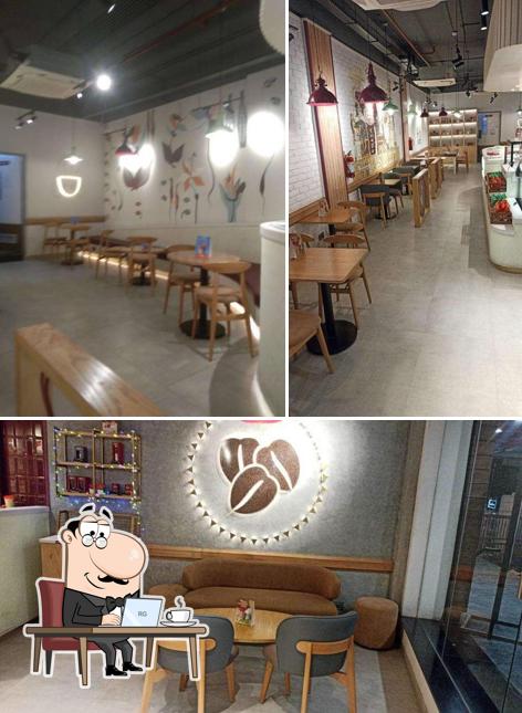 Take a seat at one of the tables at Costa Coffee