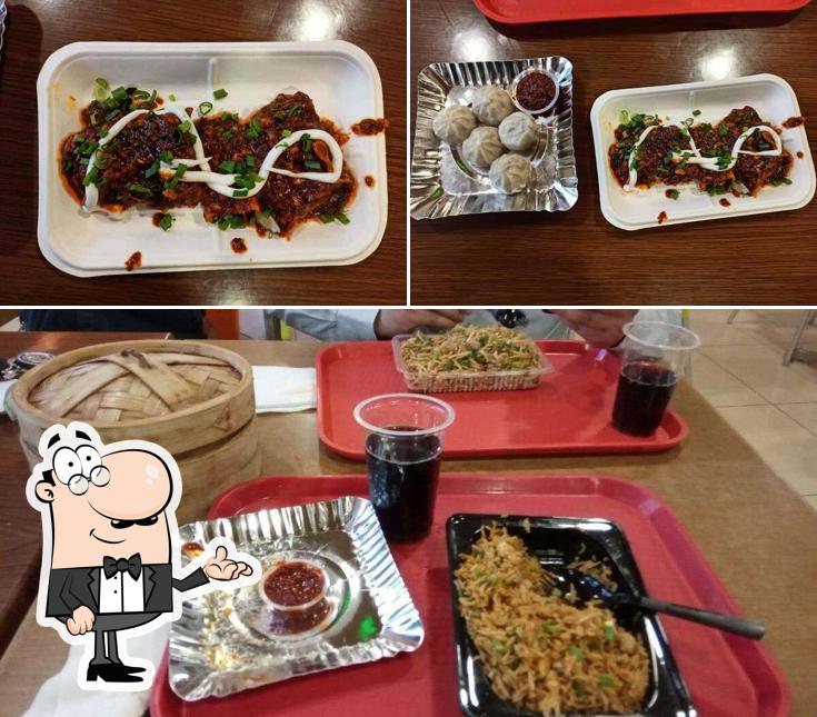 The interior of MoMoS Eatery - Chinese Food in Vadodara/Pan Asian Food/Frozen Momos/Street Food/Best Momos in Vadodara