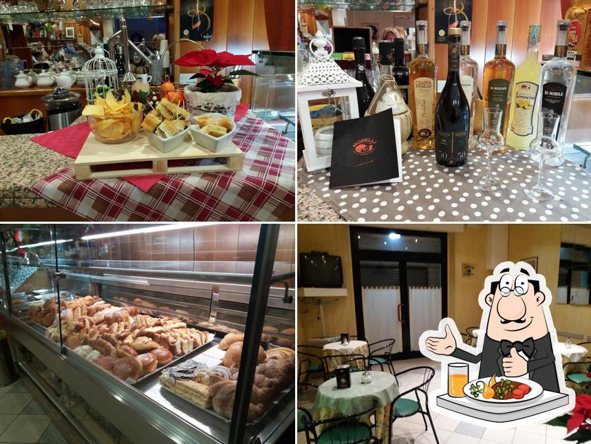 Questa è la immagine che presenta la cibo e interni di Bar Gini
