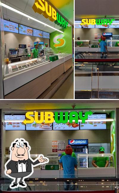 Take a seat at one of the tables at Subway Silver Arc Mall