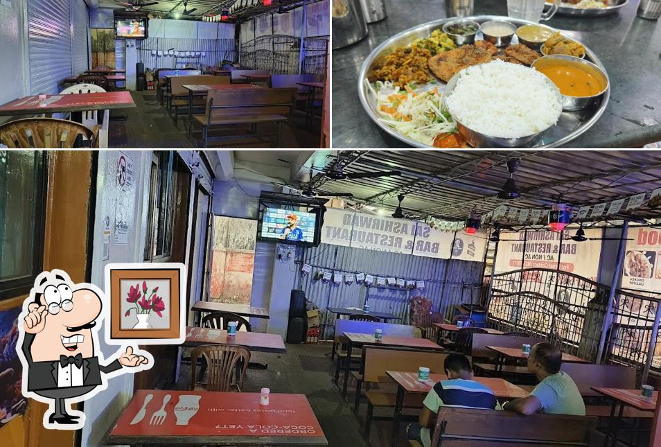 The image of interior and food at Sai Ashirwad Family Bar & Restaurant