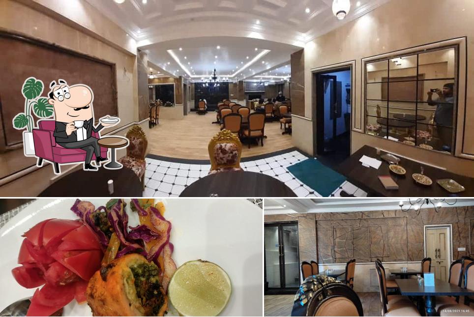 Take a look at the image displaying interior and food at Tomatoes Restaurant