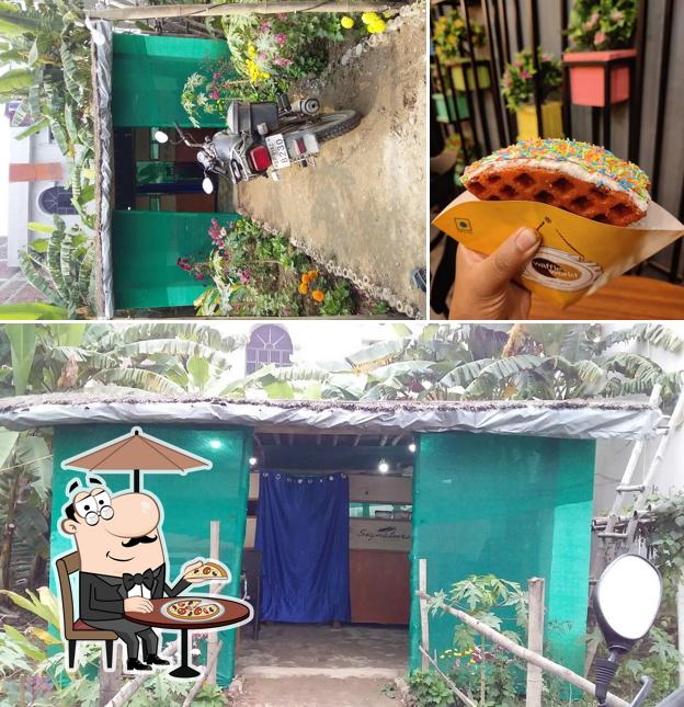 The photo of Desi Food Plaza’s exterior and food