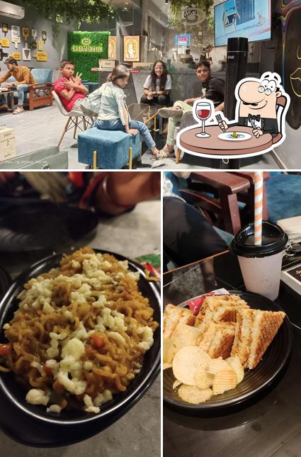 The picture of food and interior at Cafe Creamoholic Motera