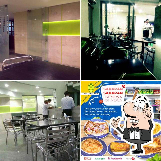 Take a seat at one of the tables at Nasi Kandar Pelita Halal Malaysian Cuisine