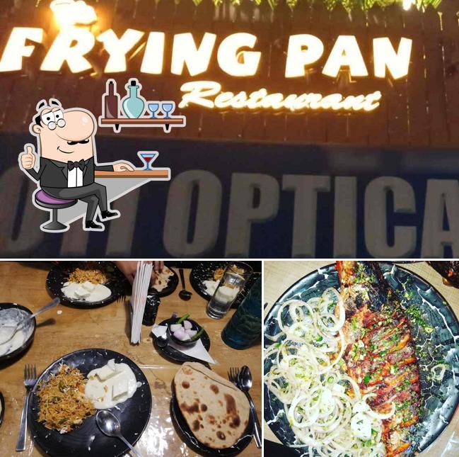 Take a seat at one of the tables at THE FRYING PAN