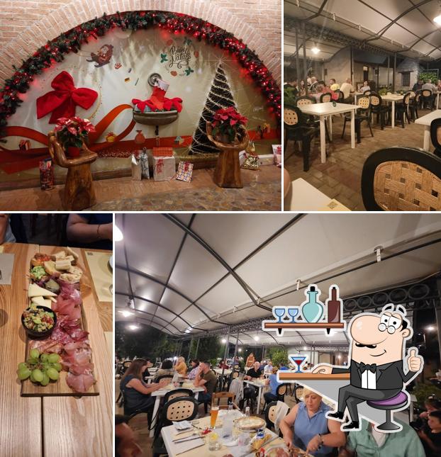 Dai un'occhiata agli interni di Trilogy Restaurant & Pizza