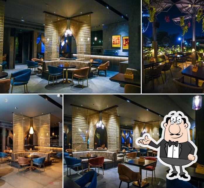 Take a seat at one of the tables at 24K Kraft Brewzz Fine Dine Restaurant Taproom Lounge Bar