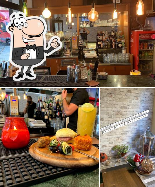 Questa è la immagine che presenta la interni e bancone da bar di Cococ Bistrot Roma Cipro