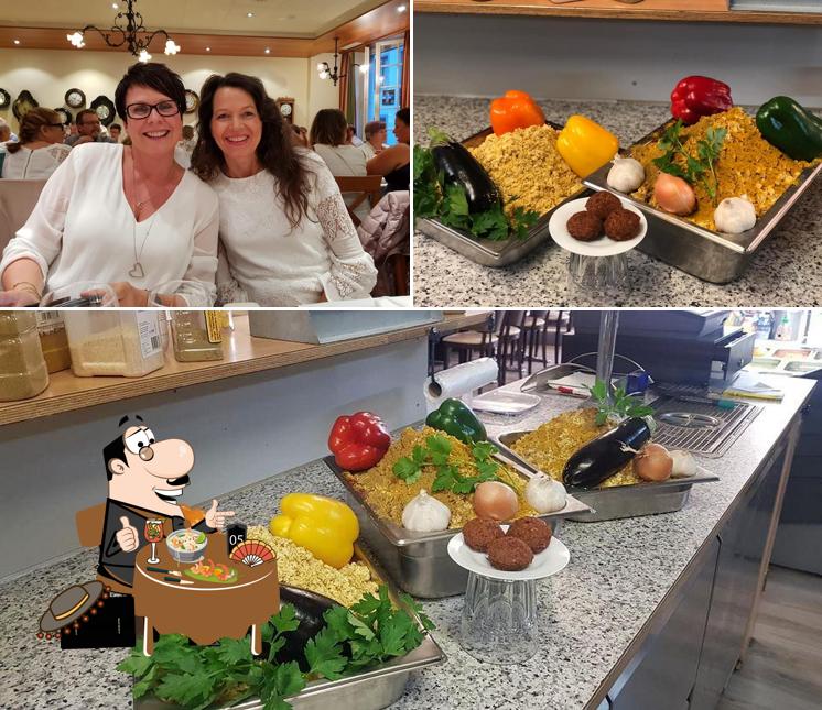 Tra le diverse cose da Imbiss Babylon GmbH si possono trovare la cibo e tavolo da pranzo