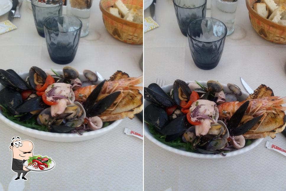 Prova la cucina di mare a Trattoria Pizzeria Tini