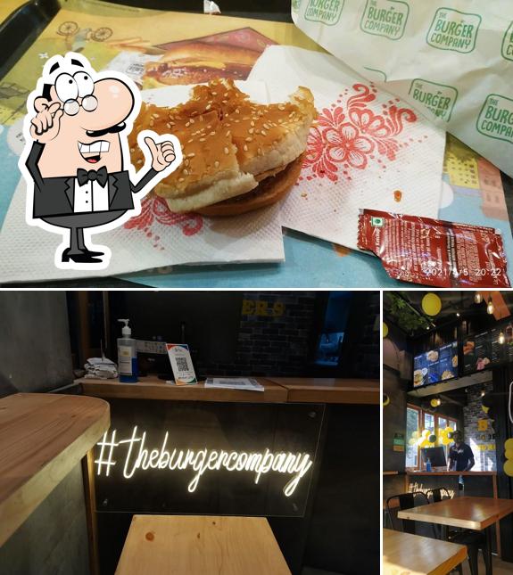 This is the picture depicting interior and burger at The Burger Company