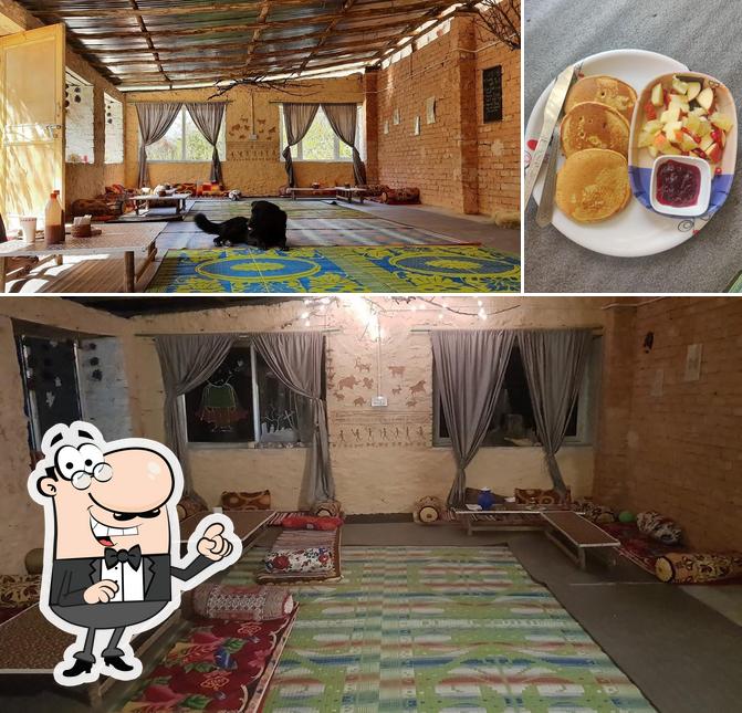 Check out the picture showing interior and food at Meraki cafe camping and cakes