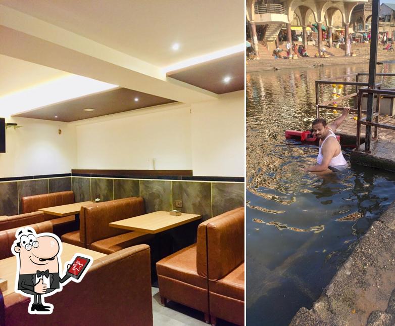 See the image of Sneha Bar & Restaurant