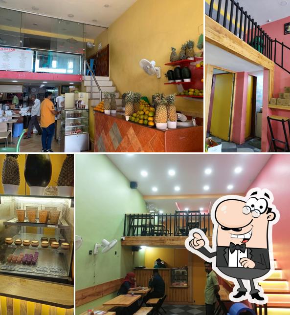 Take a seat at one of the tables at Rajasthan Ice cream Parlour