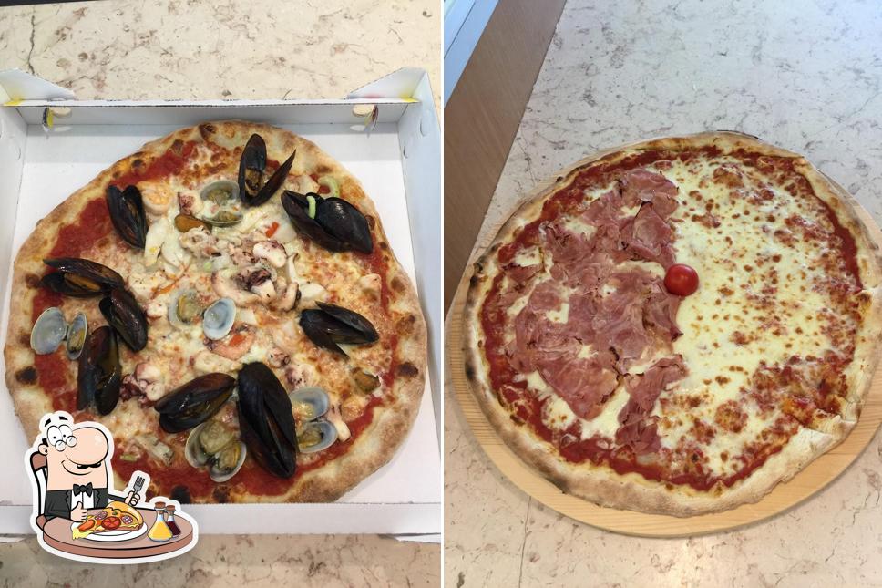 Prenditi una pizza a LAST BEACH PIZZERIA GASTRONOMIA ALBARELLA