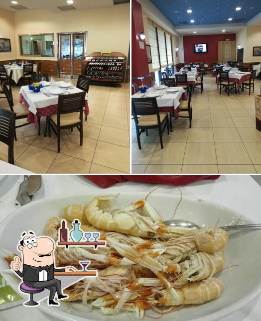 Dai un’occhiata alla foto che raffigura la interni e cibo di Ristorante Giulio Cesare