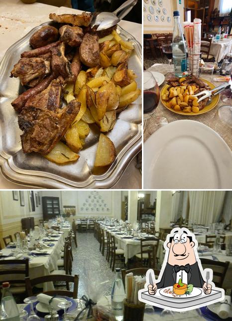 La foto della cibo e interni di Ristorante Al Caminetto