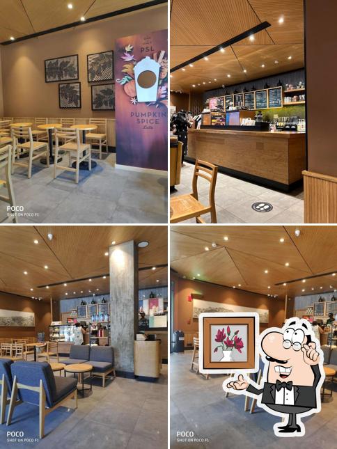 Take a seat at one of the tables at Starbucks