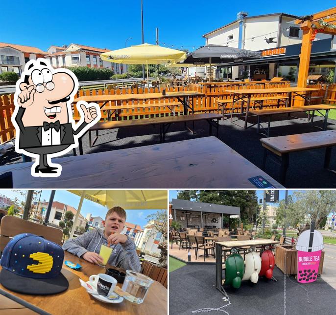 Dai un'occhiata agli interni di Snack Bar Garden