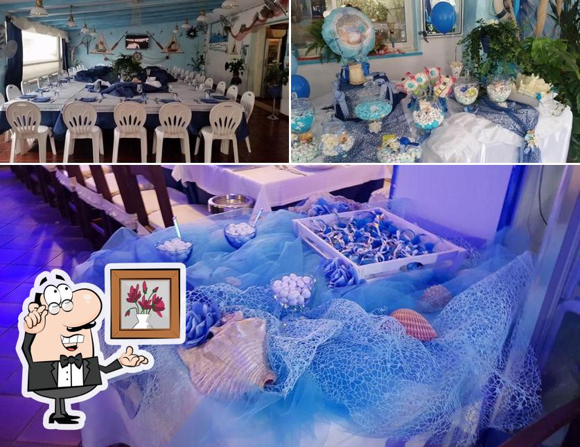 La immagine di interni e cibo da Ristorante Pizzeria Azzurra di Pischedda Augusto e Chessa Marco