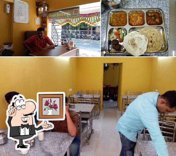 This is the photo depicting interior and food at Swad dining hall