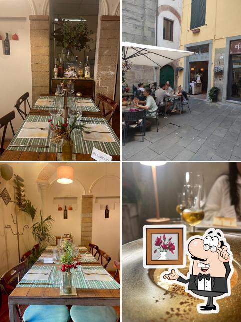 Dai un'occhiata agli interni di Baccanale Wine Bar & Bistrot