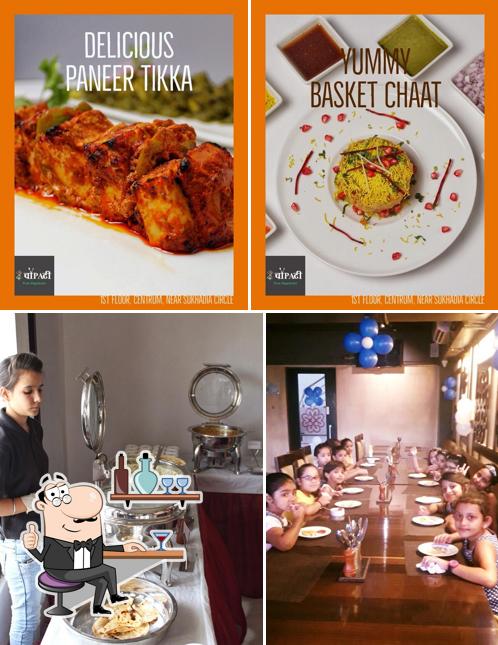 This is the photo depicting interior and food at Chowpati Udaipur