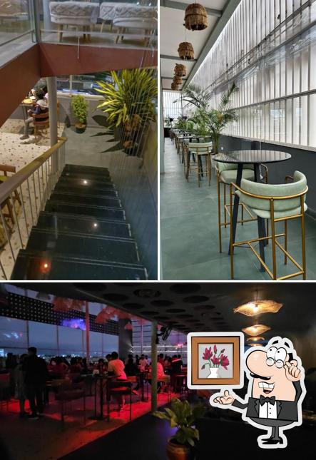 Take a seat at one of the tables at Shift Lounge, Marathahalli