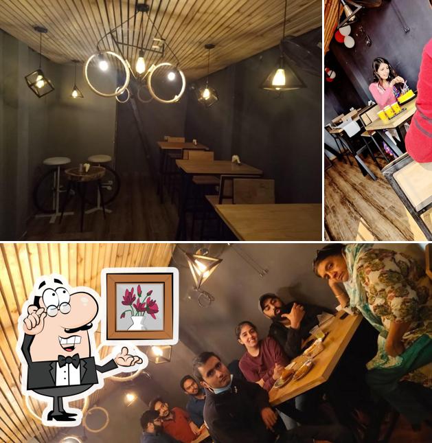 The interior of चर्चा on Chai