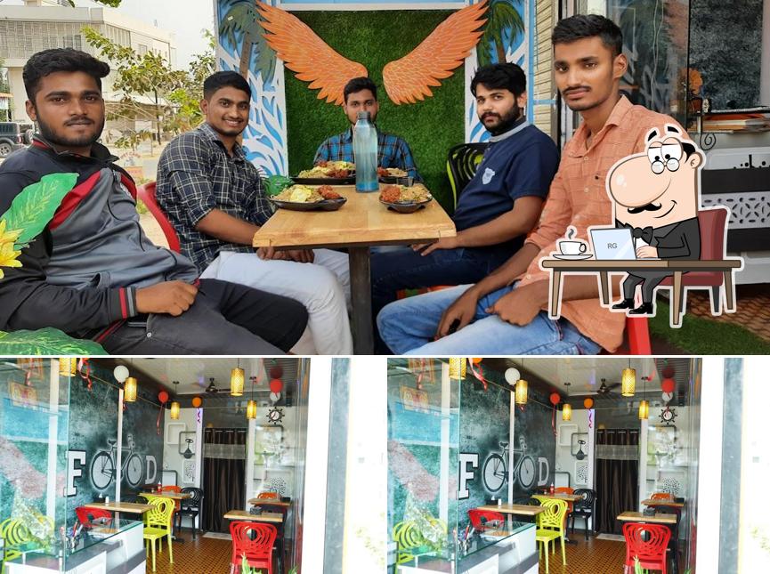 Take a seat at one of the tables at Food katta