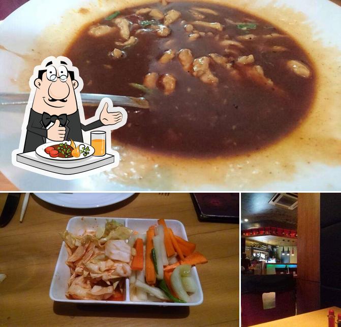 This is the image displaying food and bar counter at Soy - Le Royce Hotel