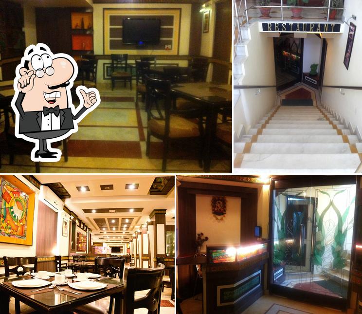 The interior of The Mint Leaf Restaurant - Hotel Shiva Residency