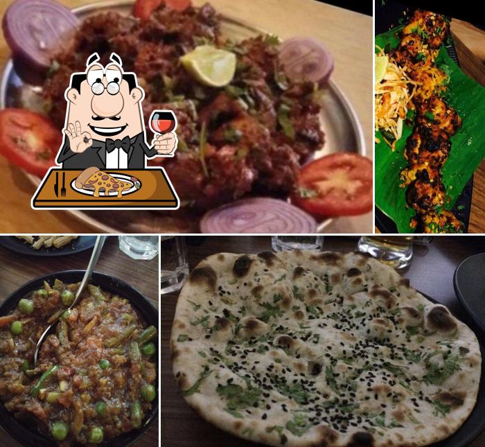 Get pizza at Central Prabhu Restaurant & Bar